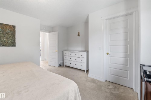 Recessed lighting, light-colored carpeting, white paneled doors, and white trim - #71 330 Bulyea Rd Nw, Edmonton, AB 