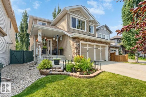 Contemporary two-story exterior featuring siding and stone accents - 22 Voleta Crest, Spruce Grove, AB 