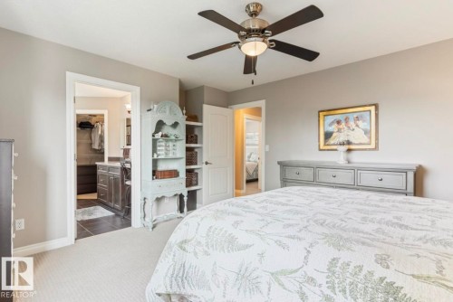Wall-to-wall carpeting and neutral wall tones - 22 Voleta Crest, Spruce Grove, AB 