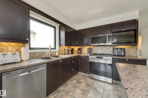 1123 48 Street Nw, Edmonton, AB - Indoor Photo Showing Kitchen With Double Sink