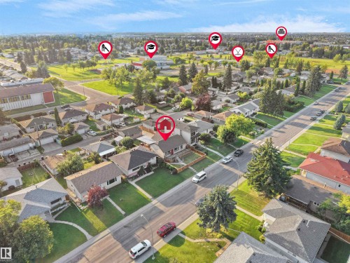 Residential street with established homes, green spaces, and paved roads - 13338 131 Street Nw, Edmonton, AB 