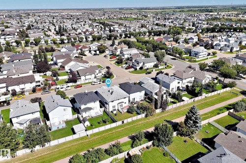Aerial perspective of a residential neighborhood with a variety of single-family homes - 4711 152 Avenue Nw, Edmonton, AB 