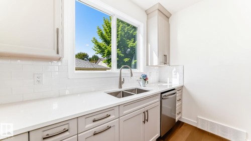 10721 70 Avenue Nw, Edmonton, AB - Indoor Photo Showing Kitchen With Double Sink With Upgraded Kitchen
