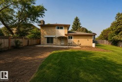 Spacious two-story residence with stucco exterior and multi-level design - 