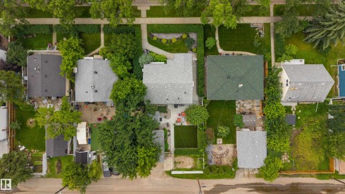 Overhead neighborhood view showcasing multiple residences with diverse roofing materials and established landscaping - 14814 104 Avenue Nw, Edmonton, AB - Outdoor With View