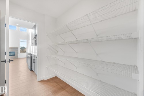 Pantry featuring extensive wire shelving - 511 157 Avenue Ne, Edmonton, AB 