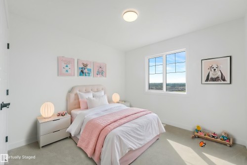 White walls with recessed window, light-colored carpeting, and flush-mount ceiling lighting - 511 157 Avenue Ne, Edmonton, AB 
