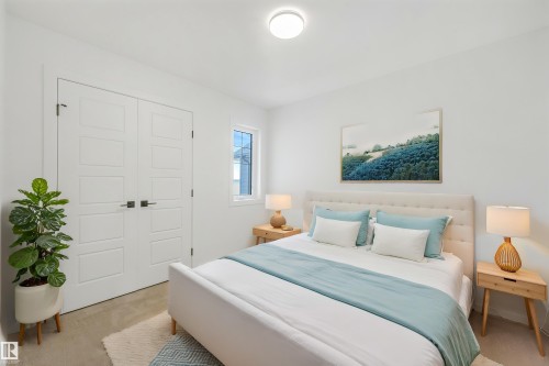 White paneled doors with dark hardware, a single pane window, and light-colored carpet - 511 157 Avenue Ne, Edmonton, AB 