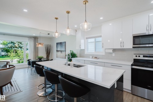 11455 111A Avenue Nw, Edmonton, AB - Indoor Photo Showing Kitchen With Double Sink With Upgraded Kitchen