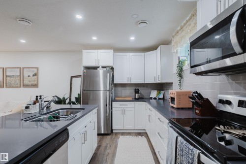 11455 111A Avenue Nw, Edmonton, AB - Indoor Photo Showing Kitchen With Double Sink With Upgraded Kitchen