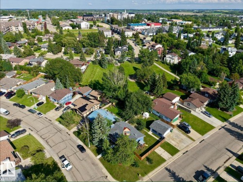 Residential area featuring mature trees and established homes - 5201 56A Street, Beaumont, AB 