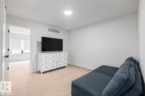 Recessed ceiling light, wall-to-wall carpeting, and white painted walls - 4023 Hawthorn Link Link Sw, Edmonton, AB 