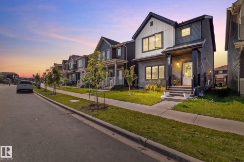 Modern two-story exterior with contrasting siding and trim - 4023 Hawthorn Link Link Sw, Edmonton, AB 