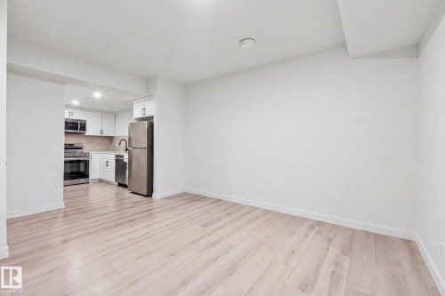 Wood-finish flooring throughout - 4023 Hawthorn Link Link Sw, Edmonton, AB 