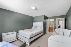 Carpeted flooring with painted walls and a flush-mount ceiling light - 
