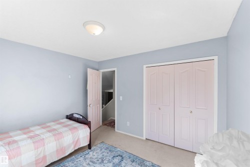 Wall-to-wall carpeting and neutral wall tones - 13028 34 Street Nw, Edmonton, AB 