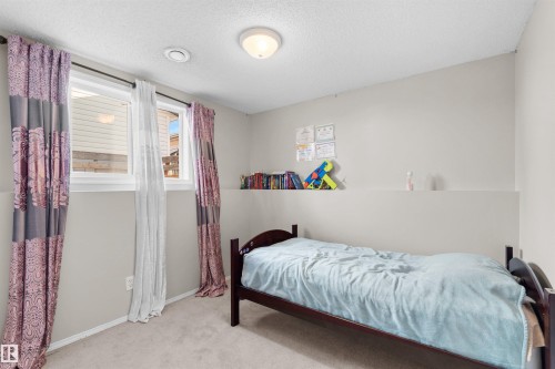 Carpeted flooring, recessed lighting, and dual windows - 13028 34 Street Nw, Edmonton, AB 