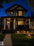 Two-story property with a covered porch, bay window, and exterior lighting - 3830 22 Street Nw, Edmonton, AB 
