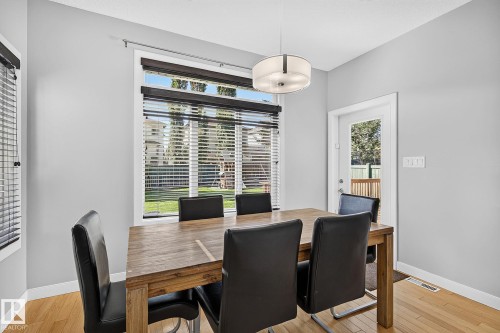 Roomy dining room with door to the deck - 5 Verona Crescent, Spruce Grove, AB 