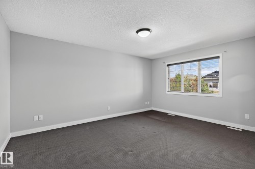 Bedroom virtually staged - 5 Verona Crescent, Spruce Grove, AB 