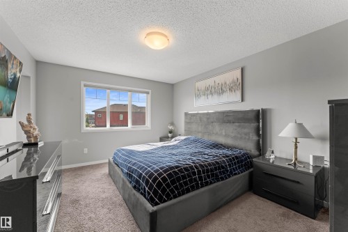 Carpeted flooring paired with neutral wall tones - 12218 176 Avenue Nw, Edmonton, AB 