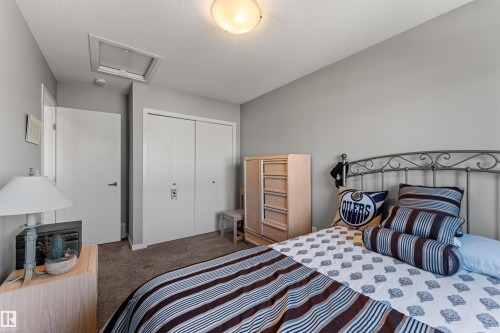 Carpeted flooring with a flush-mount ceiling light - 12218 176 Avenue Nw, Edmonton, AB 