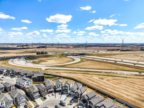 Residential neighborhood with cul-de-sac street patterns, proximity to major roadways, and surrounding open fields - 2435 12 Avenue Nw, Edmonton, AB 