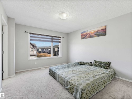 Carpeted flooring, white walls, built-in window, and overhead lighting - 2435 12 Avenue Nw, Edmonton, AB 