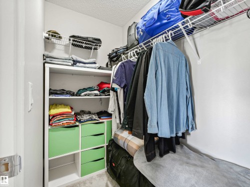 Built-in shelving with storage cubbies and wire racks - 2435 12 Avenue Nw, Edmonton, AB 