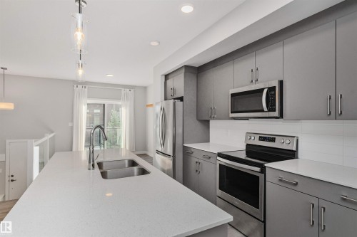 #17 1729 Keene Cr Sw, Edmonton, AB - Indoor Photo Showing Kitchen With Double Sink With Upgraded Kitchen