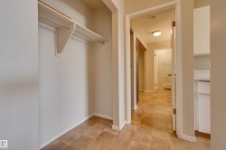 Front hall closet off of kitchen area. - 