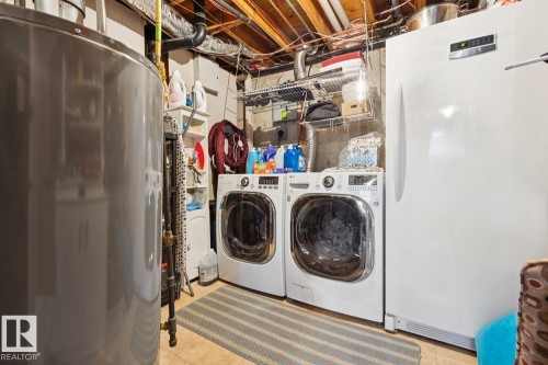 Front load washer & dryer and freezer will stay. Furnace and Hot water tank was replaced in 2013 - 14243 24 Street Nw, Edmonton, AB 