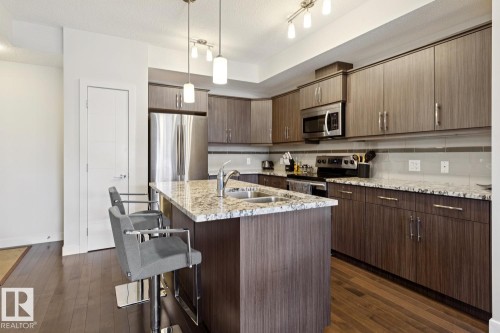 #421 10523 123 St Nw, Edmonton, AB - Indoor Photo Showing Kitchen With Double Sink With Upgraded Kitchen