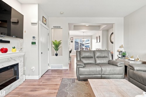 Wood-finish flooring throughout - 8024 Orchards Green Green Sw, Edmonton, AB 