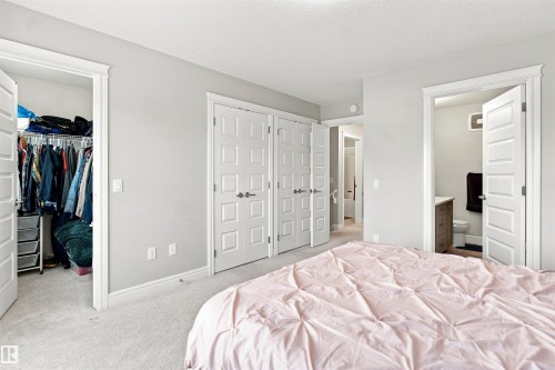 Carpeted flooring, white trim, light gray painted walls, and paneled interior doors - 8024 Orchards Green Green Sw, Edmonton, AB 