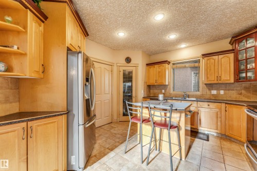 8715 160A Avenue Nw, Edmonton, AB - Indoor Photo Showing Kitchen With Double Sink