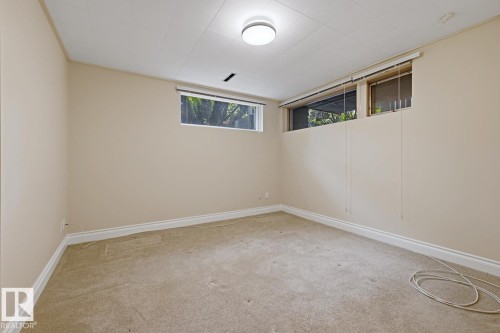 Recessed ceiling, neutral wall paint, and wall-to-wall carpeting - 7508 139 Street Nw, Edmonton, AB 