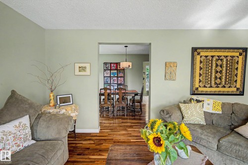 Hardwood flooring and light green wall finishes - 36 Lodgepole Crescent, St. Albert, AB 