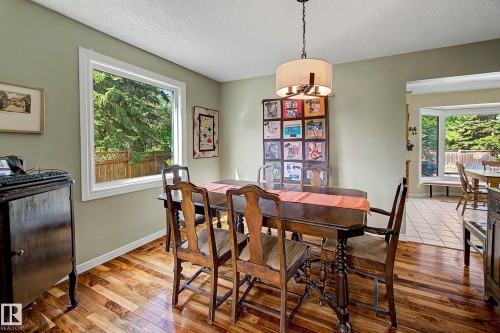 Hardwood flooring and light green wall paint - 36 Lodgepole Crescent, St. Albert, AB 