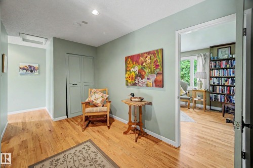 Hardwood flooring throughout, recessed lighting, and a built-in closet with double doors - 36 Lodgepole Crescent, St. Albert, AB 