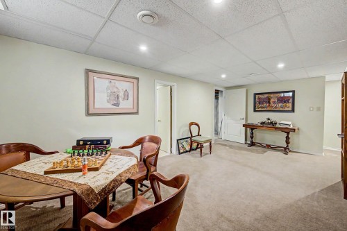 Recessed lighting, drop ceiling, and neutral carpeting - 36 Lodgepole Crescent, St. Albert, AB 