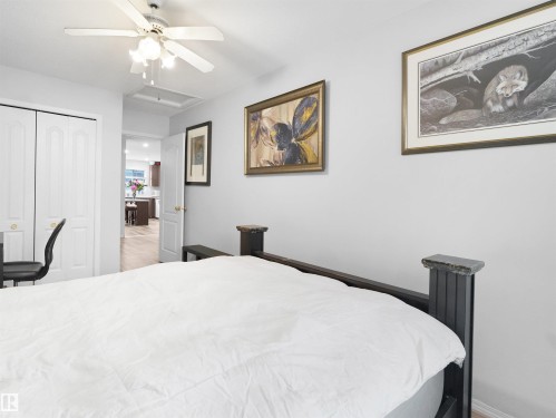 White ceiling fan with light fixture - 15511 45 Street Nw, Edmonton, AB 
