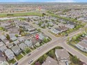 Residential neighborhood setting with mature trees and a nearby water body - 15511 45 Street Nw, Edmonton, AB 