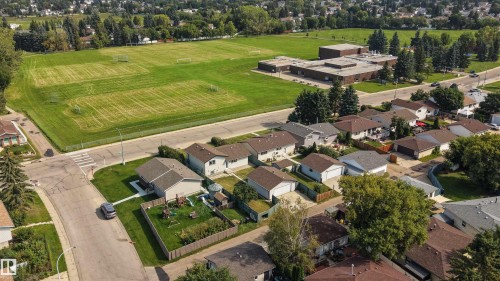Residential neighborhood setting with established homes, green spaces, and community facilities - 904 Knottwood S Nw, Edmonton, AB 