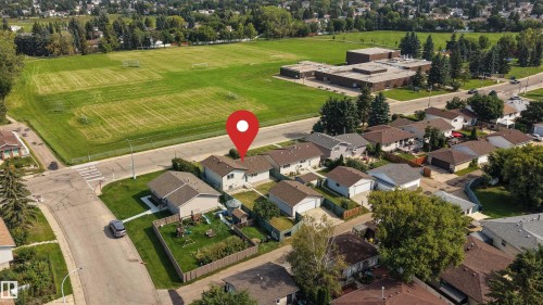 Aerial perspective showcasing the property within a residential neighborhood - 904 Knottwood S Nw, Edmonton, AB 
