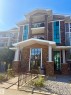 Stacked stone and siding exterior with multiple balconies - #1304 9363 Simpson Dr Nw, Edmonton, AB 