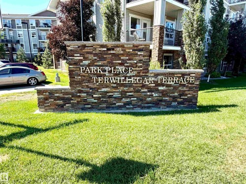 Stacked stone monument with raised lettering - #1304 9363 Simpson Dr Nw, Edmonton, AB 