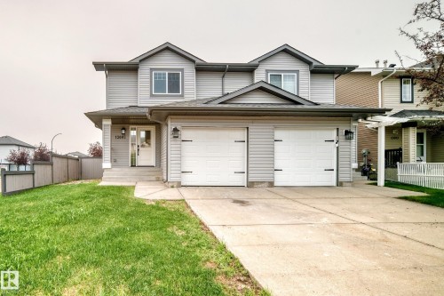 Two-story residential structure featuring light gray siding and a dark gray roof - 13005 162A Avenue Nw, Edmonton, AB - Outdoor