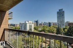 Balcony with metal railing and brick exterior - 