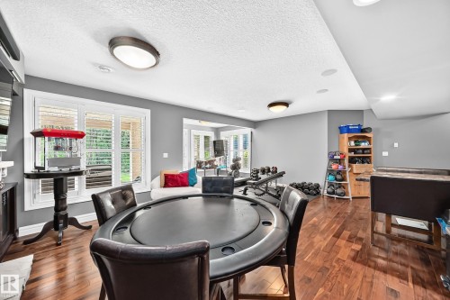 multiple windows with plantation shutters, recessed lighting, and ceiling-mounted fixtures - 417 Caldwell Place Nw, Edmonton, AB 